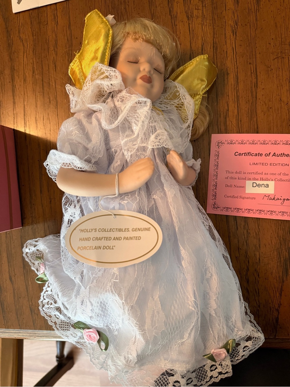Holly's Collectibles Porcelain Doll in White Lace with Gold Wings